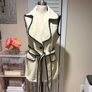 Ivory double breasted vest with blanket stitch detail